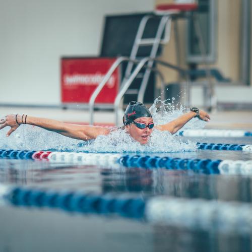 Woman butterfly swimming